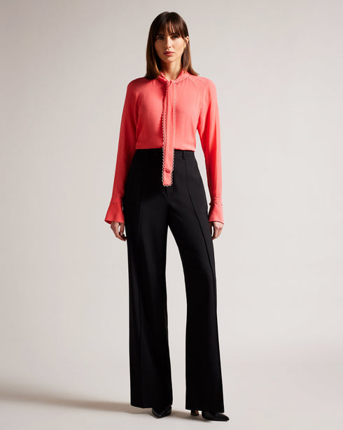 JULINAA-Tops-JULINAA is a lightweight, feminine layer that transitions easily from day to evening. This lightweight blouse pairs wonderfully with wide-leg trousers and heels for a polished office look—or switch it up for jeans and sandals on a sunny weekend getaway. Blouse Neck tie Looped rouleaux trim Long sleeved Button fastening Lightweight fabric Julia is 5'10" / 1.78m and wears Coral in a Ted size 1- Ted Baker Romania